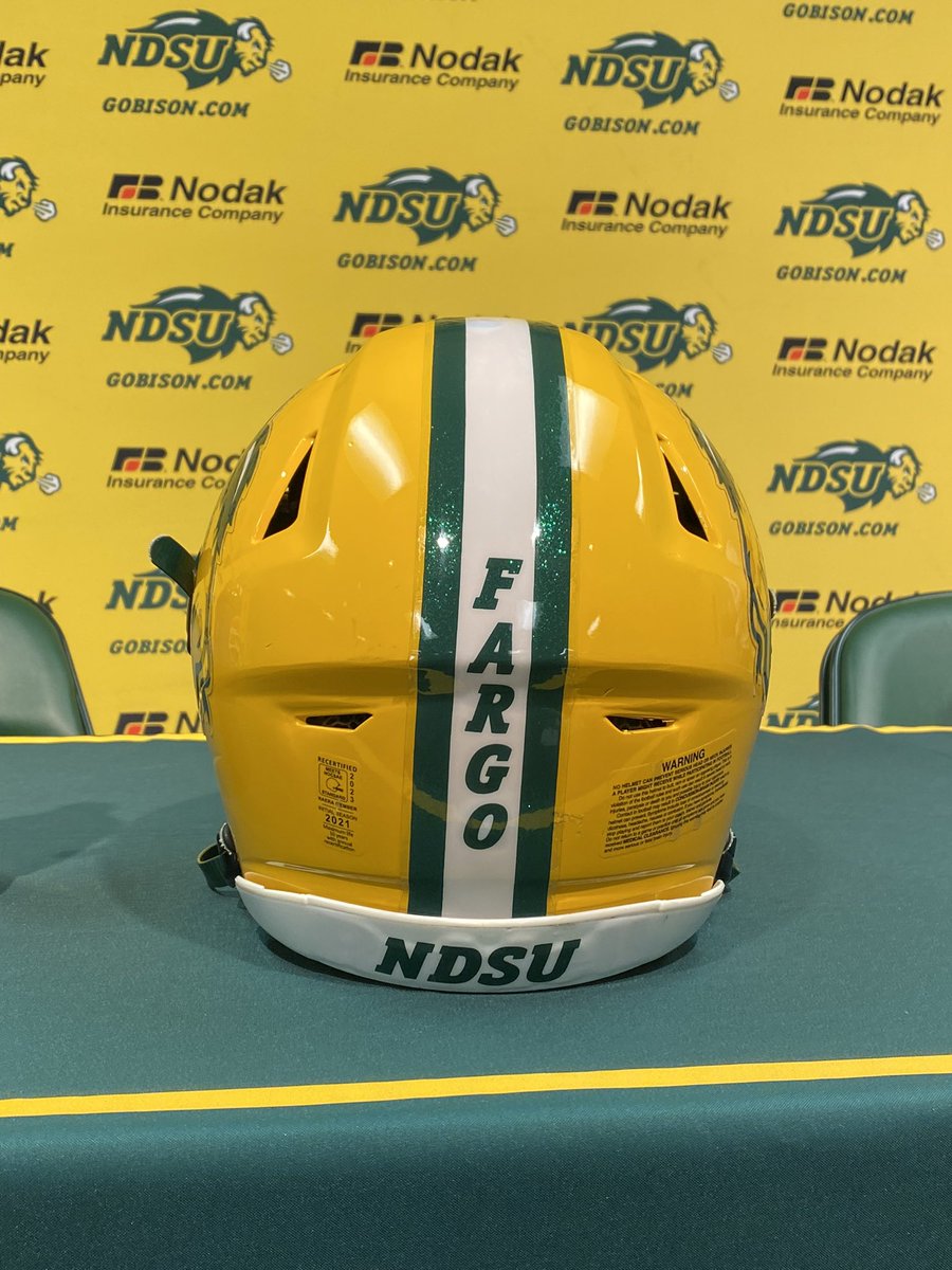 TheFlagSports's tweet photo. Usually @NDSUfootball reps “Bison” on the helmet, but this Saturday against Maine it will be “Fargo”. They are honoring first responders at the game with it being played two days before 9/11. Officers Dotas, Hawes, and Robinson will do the coin toss before the game. https://t.co/xMbgyU7ykH