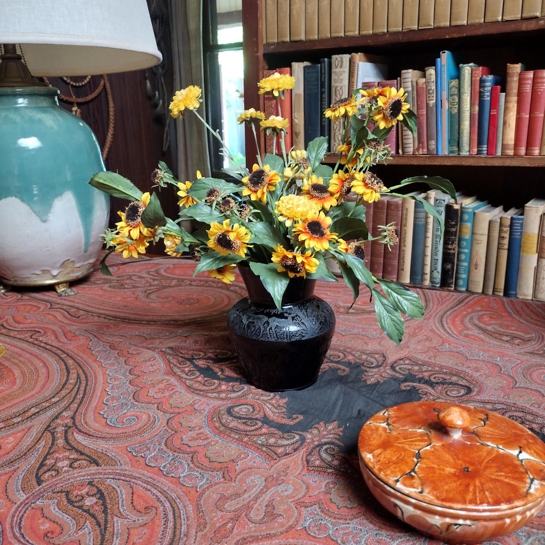 Sunflowers from the Cutting Garden on display in the Library of the historic Ranch House at Rancho Los Alamitos.  #rancholosalamitos  #LibraryDecor#Sunflowers #CuttingGarden #RanchHouse #Historic #FloralDisplay #NatureBeauty #GardenInspiration #LibraryDecoration