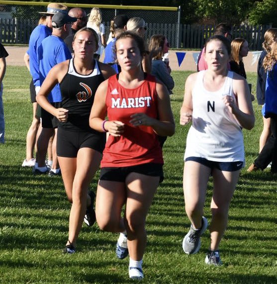 Junior Eileen Hosty and Senior Ava Mayer changed to the front of the JV race at Lyons on Saturday. Both ran season best times on the challenging 5K course.