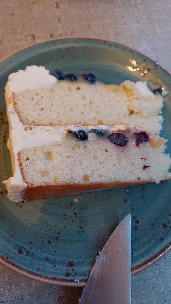 Vanilla cake, vanilla frosting, blueberries and lemon curd