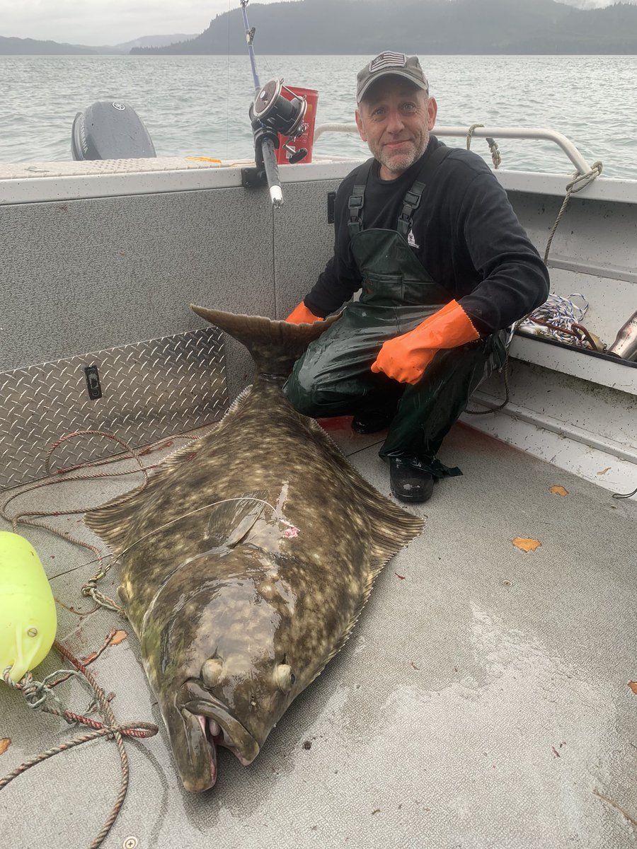 ChrisEgan5's tweet photo. Wearing my @KING5Sports @KING5Seattle @Seahawks gear with the Egan Family catch of the day! 150 halibut !! Captain Brian was amazing!!! https://t.co/e2X3NmHmVD