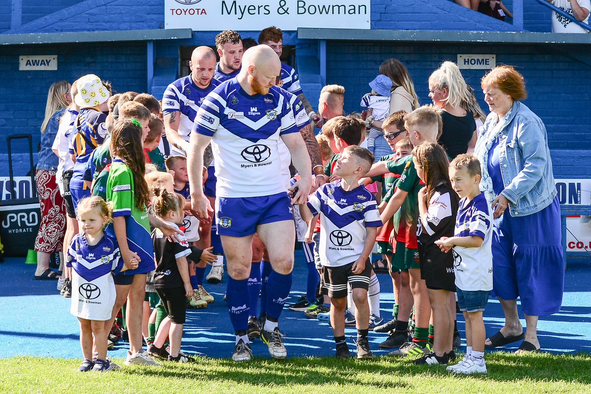 We love this photo. 
Kennedy walking out as a mascot with Beans at the weekend. Kennedy says it was the best ever. 
Sport is powerful.