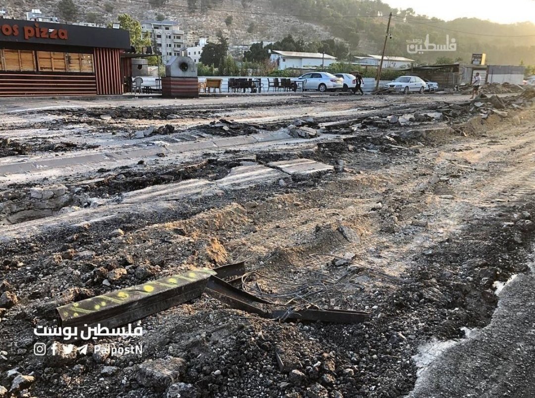 Anna_AnninaEl's tweet photo. After the invasion of Nour Shams refugee camp, Tulkarm, "Israel" leaves it in complete disaster. Blown up shops, destroyed infrastructure, Palestinian youth murdered. This is what the Palestinian people have to struggle with almost everyday. 
#DownWithOccupation
#DownWithIsrael https://t.co/6L45OKQQ1L