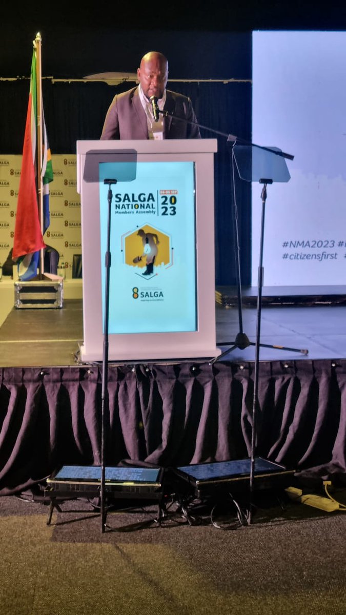 SALGA_Gov's tweet photo. Cllr. Sivuyile Ngodwana, the Executive Mayor of Ekurhuleni Metro, takes the stage at the Birchwood Hotel &amp; OR Tambo Conference Center in the City of Ekurhuleni to deliver his Welcome Remarks as the 2023 National Members Assembly commences. https://t.co/3d3CyMnnBr