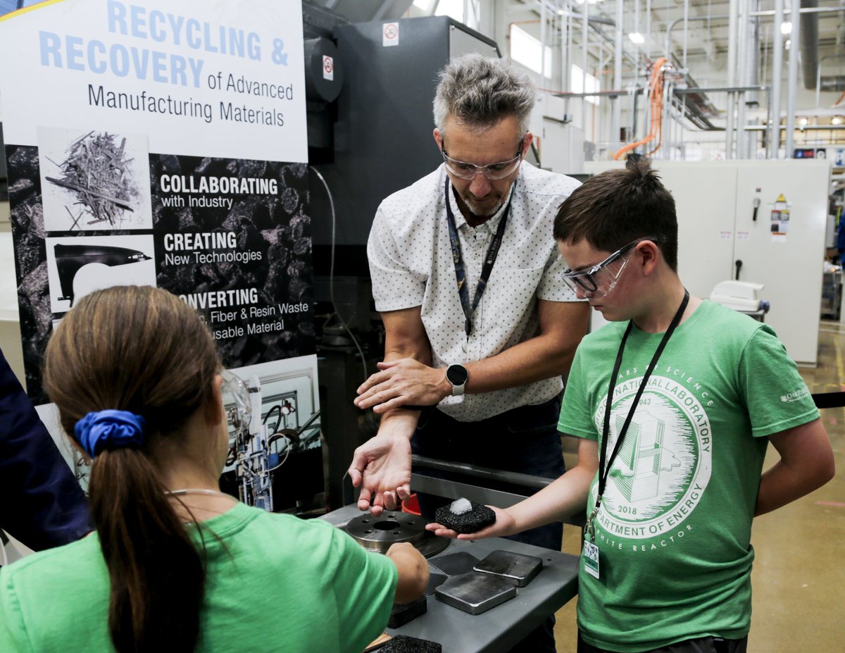 ORNLEnergy's tweet photo. Hands-on #scienceisfun! Kids visiting the Manufacturing Demonstration Facility @ORNL’s Take Your Child to Work Day used their body heat to melt ice cubes through a graphite foam developed to conduct heat away from space shuttle tiles. 🚀 #STEM #STEMtember https://t.co/RKhcf0JN2f