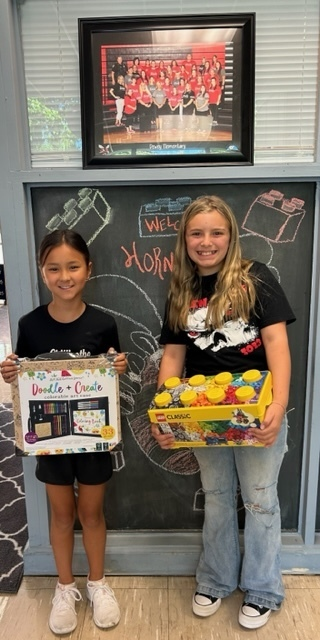 dewey_school's tweet photo. During Back to School Open House all elementary students were given punchcards.  Once punchcards were filled, students turned them into their elementary buildings for a drawing.  Dewey's winners were Lainie Tan, 4th, and Aubree Anderson, 5th. https://t.co/dptaVz5aAA