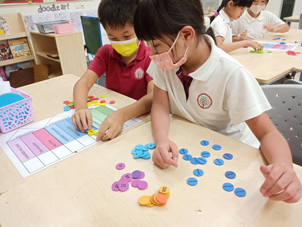 HISYear5's tweet image. Year 5s getting reacquainted with whole numbers using the math tokens and place value chart 📊

#HIS_Learning