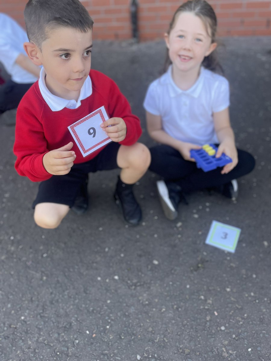 Miss_McIntosh0's tweet photo. Taking our numeracy outdoors today - children worked together through conversation and counting to find their partner making number stories 11-13 🔢⭐️ @CarmylePS https://t.co/tTil1DsPAu