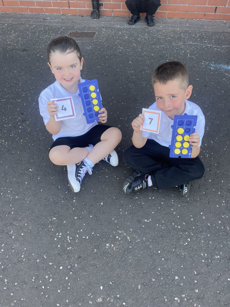Miss_McIntosh0's tweet photo. Taking our numeracy outdoors today - children worked together through conversation and counting to find their partner making number stories 11-13 🔢⭐️ @CarmylePS https://t.co/tTil1DsPAu
