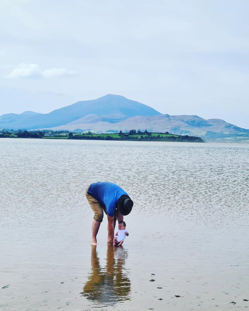 Marking one week at home by having our toes dipped in the Irish Sea by our grandad 💙