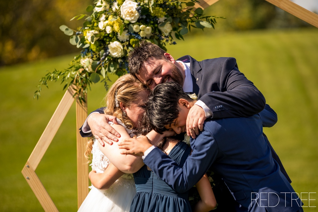 ASWeddings's tweet photo. Officiant Deb Parr helped bring together this beautiful family with a ceremony in August.. Megan &amp; Sean had their own vows and then vows with the kids that culminated with this awesome group hug. Thanks to photographer: Kristina, Redtree Photography Associate @amymoedt #family https://t.co/XjumDTUxRy
