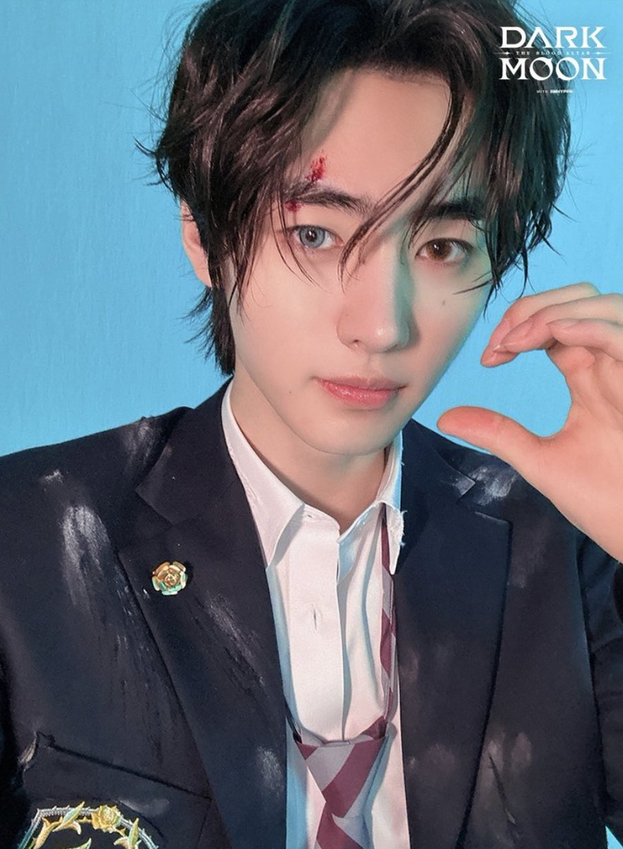 Explore this compelling image of a well-dressed young man with a blood streaked face, reminiscent of a character from a thrilling webtoon centered around vampire siblings! Do not overlook to witness the mystique of this enigmatic persona, skillfully depicted by @.darkmoon_hybe!