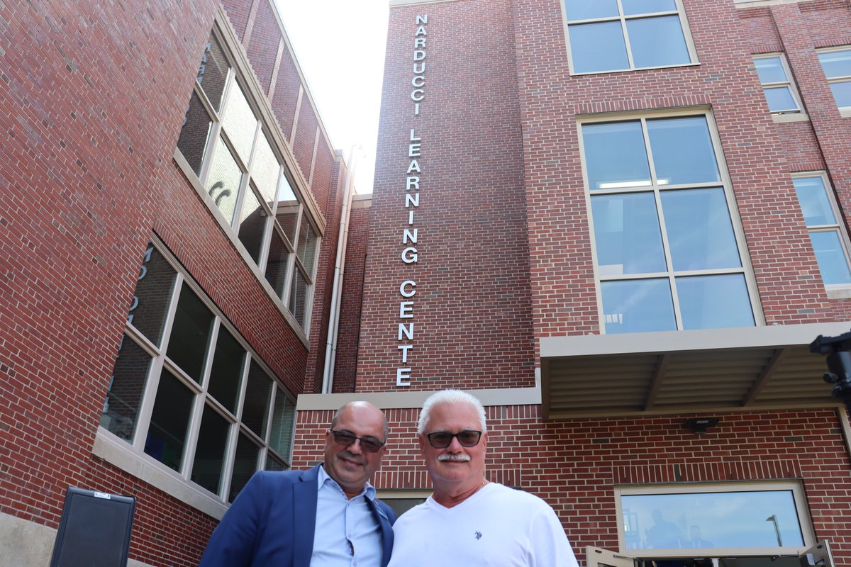 Former Ward 4 Councilman Nick Narducci, surrounded by family &amp; friends, cuts the ribbon on the newly refurbished Narducci Learning Center. The PreK-8 school opens Wed. and will be used in the short term as much-needed swing space for students as the city rebuilds other schools