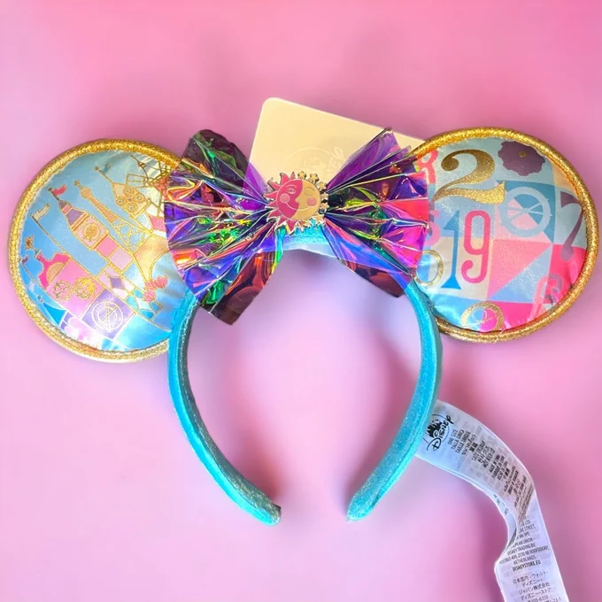 really interesting to me that the DLP small world merch has the numbers on it, when the facade over there doesnt have them 