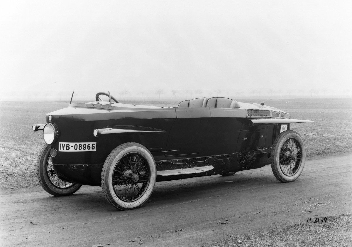 Retromotive1's tweet photo. Rumpler “teardrop” car with Benz signet. Photo from the front left from 1921. https://t.co/kmNd9fn2mT
