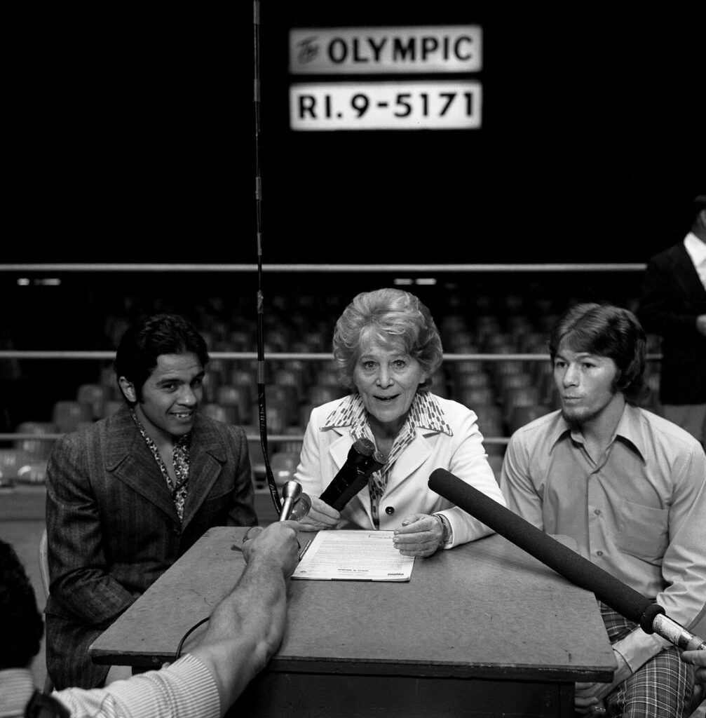 Aileen Eaton sits down with Bobby 'Schoolboy' Chacon and Danny 'Little Red' Lopez in the Olympic ring prior to their 1974 fight at the LA Sports Arena. Photo by Theo Ehret.
#18thandgrand #olympicauditorium #losangeles #lahistory #dtla #thisplacematters #boxing #aileeneaton