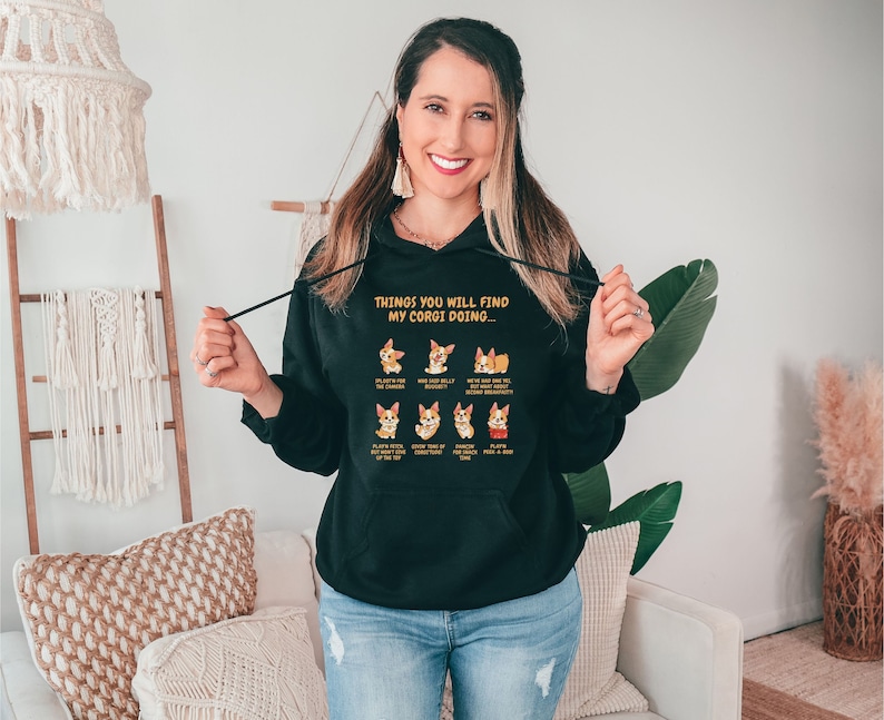 Elevate Your Corgi Love with the "Things You Will Find My Corgi Doing" Hoodie from Splootville! 
🛍️ Shop now: etsy.com/shop/splootvil…
#corgilove #splootville #cozyandchic #corgicharm #corgilovers #dogmoms #qualityhoodies