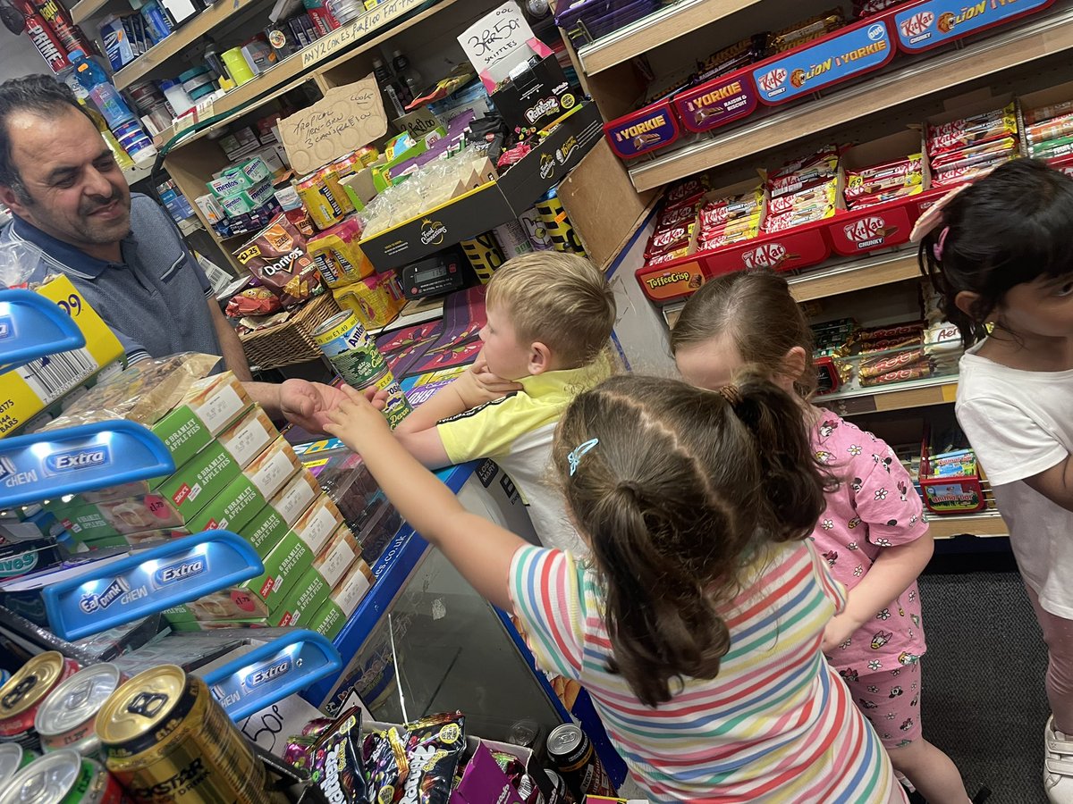 WhitecrookE's tweet photo. Promoting social and cultural capital through experiences within the community of Whitecrook. 

We took a trip to our local shop to buy some custard for our rhubarb crumble ⭐️! Working together to count the money and carry the custard back to nursery https://t.co/nNH2ViUBxs