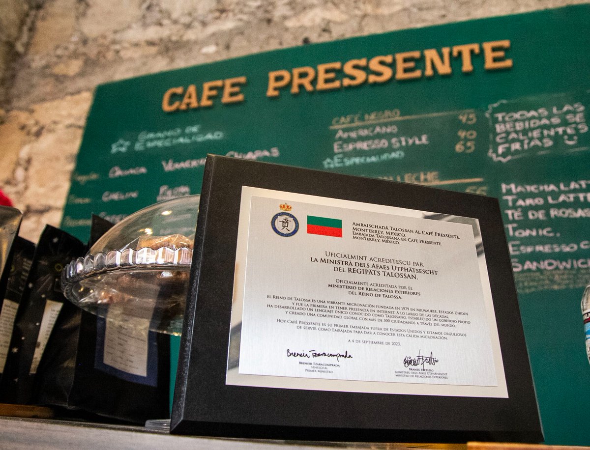 Talossa's tweet photo. It's official, the Kingdom has its newest embassy at Monterey's best place to get a cup of coffee, Cafe Pressente, owned by Minister of Foreign Affairs @BrunoExcelso #talossa https://t.co/sFuwptO3GY