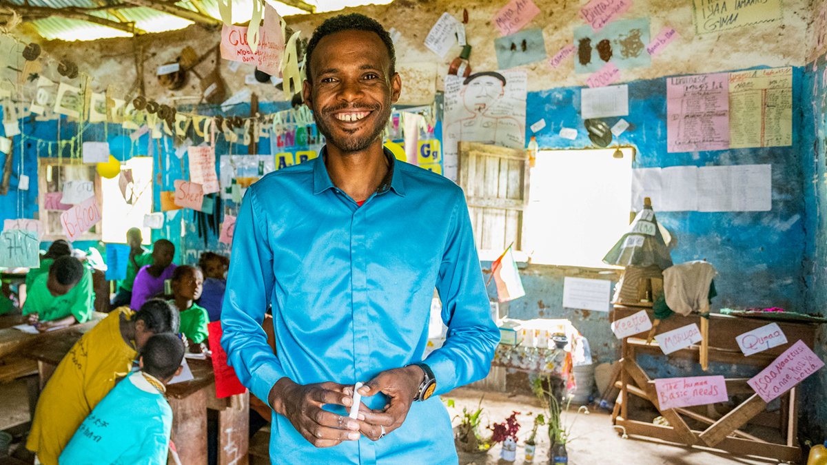 luminosfund's tweet photo. Our #communityteachers are high-potential young adults from the same communities as our students: providing students with role models who understand their backgrounds and experiences. Pictured is Luminos teacher Derese, from #Ethiopia! Derese always dreamed of becoming a teacher. https://t.co/sOmctR38k4