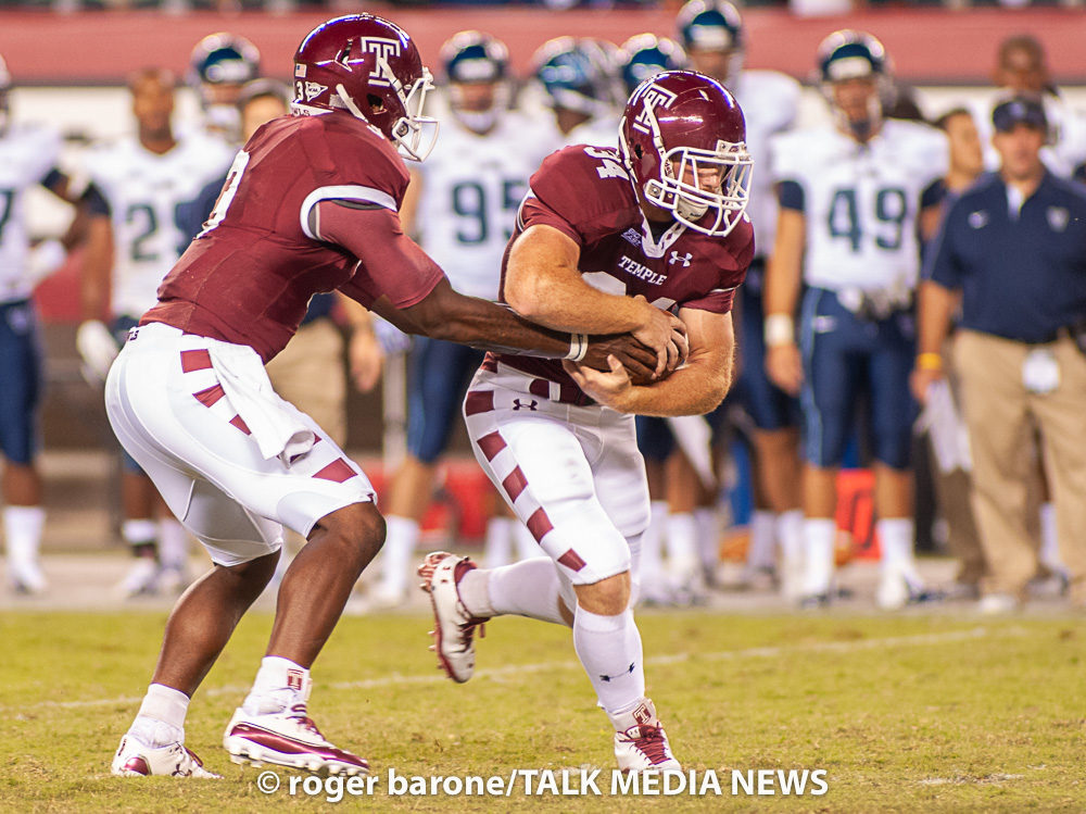 fotosfromphilly's tweet photo. Spencer Reid, #34, son of former Eagles coach #Andy_Reid, takes a handoff in 4th quarter against Villanova in @Temple_FB 2012 season opener. (8-31-12) My 1st Temple game & still at it 11 yrs later. @PaFootballNews @NovaAthletics @parks @DHuntTrib @American_FB @TempleOwls https://t.co/Q1KRgMhHfH