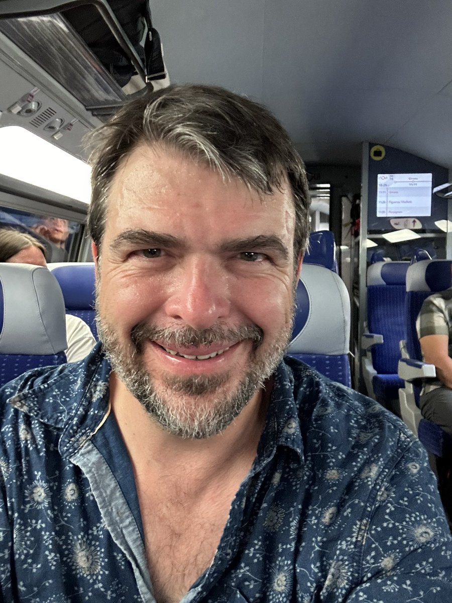 billbenbob's tweet photo. We’re on the high speed train from Barcelona to Paris! What an absolute triumph of engineering and cross country cooperation. Last time I did this route by rail it required the tren hotel that went slow and had to run on different gauge tracks overnight. https://t.co/w3HjfqFGFY