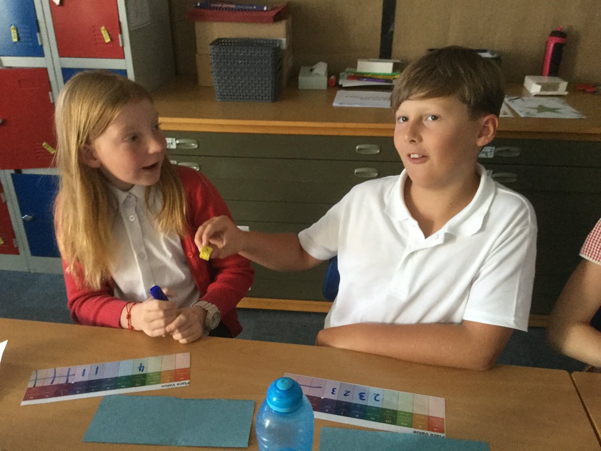 StIgOssett's tweet image. It’s quite tense in Class 5 this morning battling one another with some place value games! They were having a great time comparing numbers to ten million and explaining their tactics. #primarymaths #placevalue