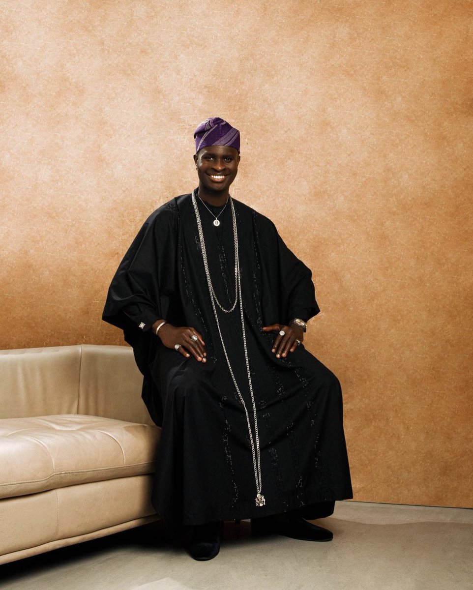 Justshakara's tweet photo. Our client; @larryhector_ dazzles in a custom three-piece black agbada with Swarovski detailing paired with a purple aso oke cap tailored to perfection by us. 💜🖤 https://t.co/eL135ZCtpa