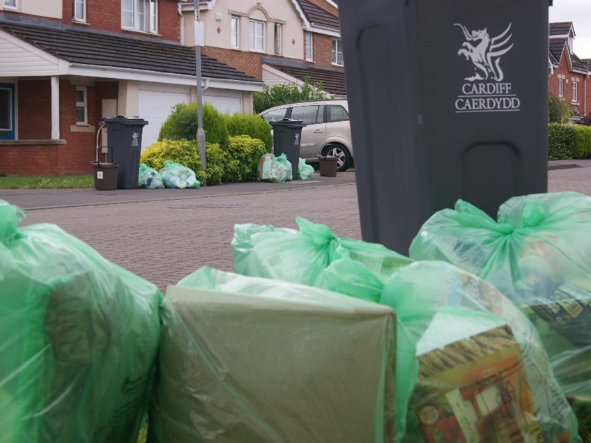 cardiffcouncil's tweet photo. Due to strike action waste collections in #Cardiff are changing: 

❌Garden waste collections are cancelled.

♻️ Recycling (green bags) will be collected on the same day as general waste (black bin).

👉https://t.co/Ykbfogc3L9 https://t.co/tm6m8EnrkX