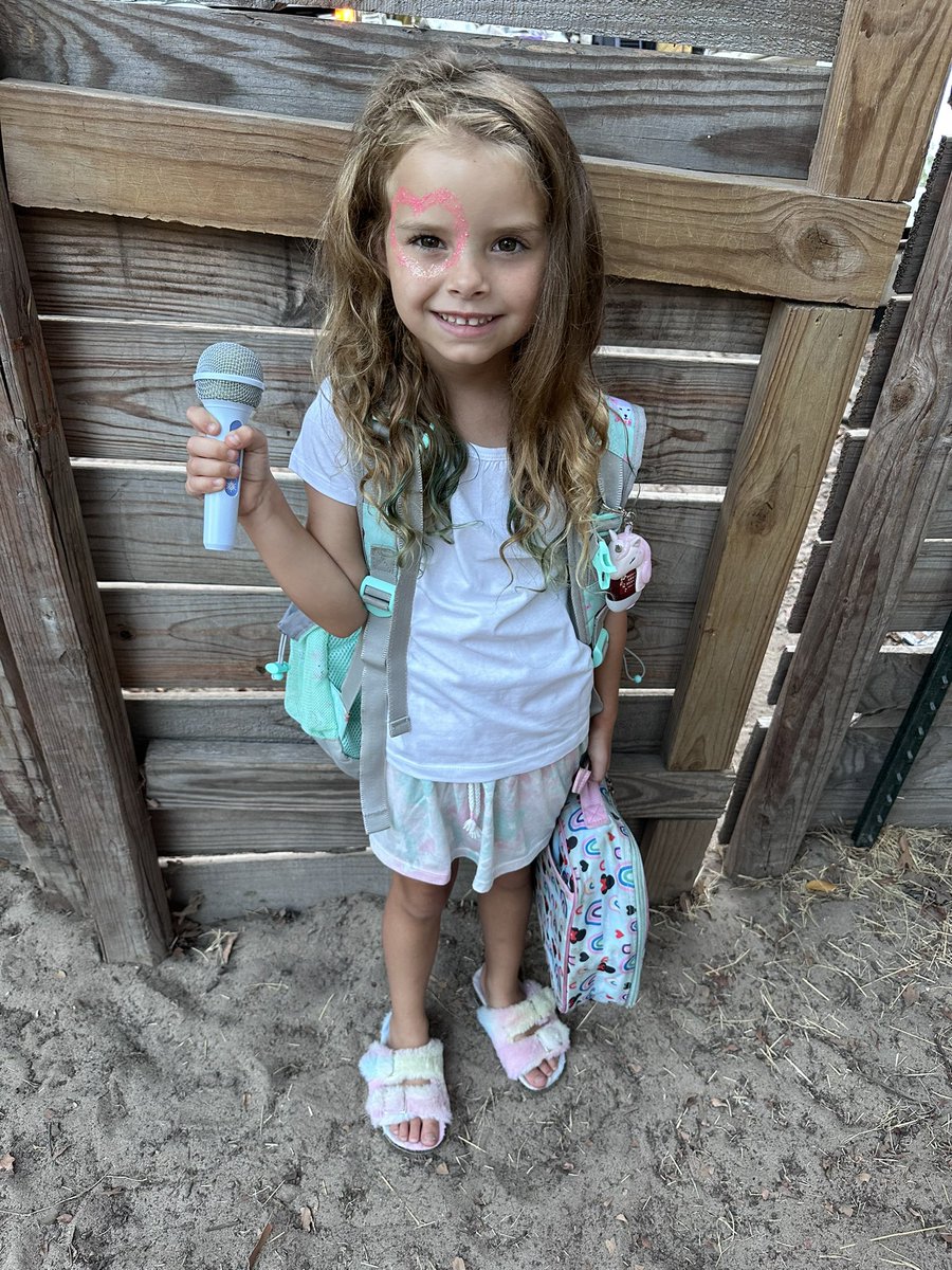 Baysil13's tweet photo. @taylorswift13 my daughter chose to dress up as you on the Lover cover for Homecoming week! Hoping to surprise her with tickets to one of your New Orleans dates next year since we missed this leg of the Eras tour 🤞🏻 https://t.co/SbuhBWjsCP