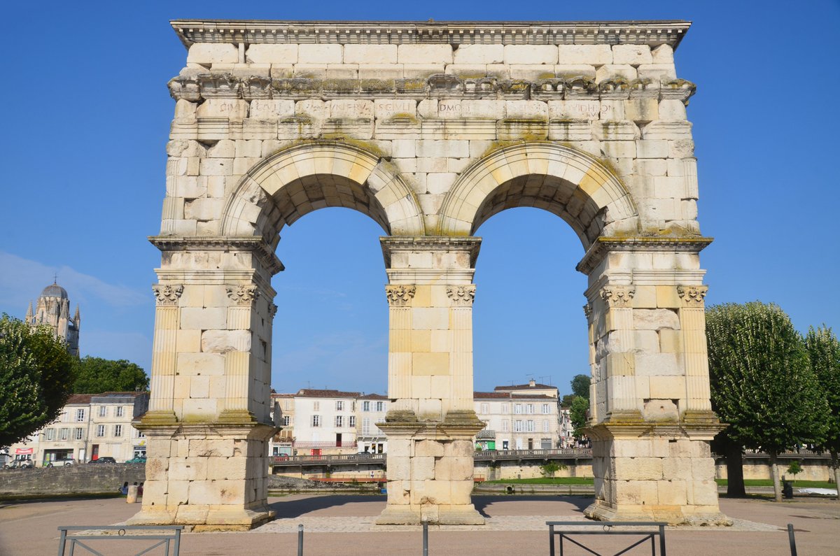 carolemadge's tweet photo. #RuinoftheDay - The Arch of Germanicus in Saintes (France), a Roman arch dedicated in AD 18/19 to the emperor Tiberius, his son Drusus Julius Caesar, and his adoptive son Germanicus. It was paid for by a prominent citizen of Mediolanum Santonum, C. Julius Rufus. The arch was made of limestone blocks, had two bays and was originally sited over the terminus of the Roman road from Lugdunum (Lyon) to Mediolanum Santonum (Saintes).