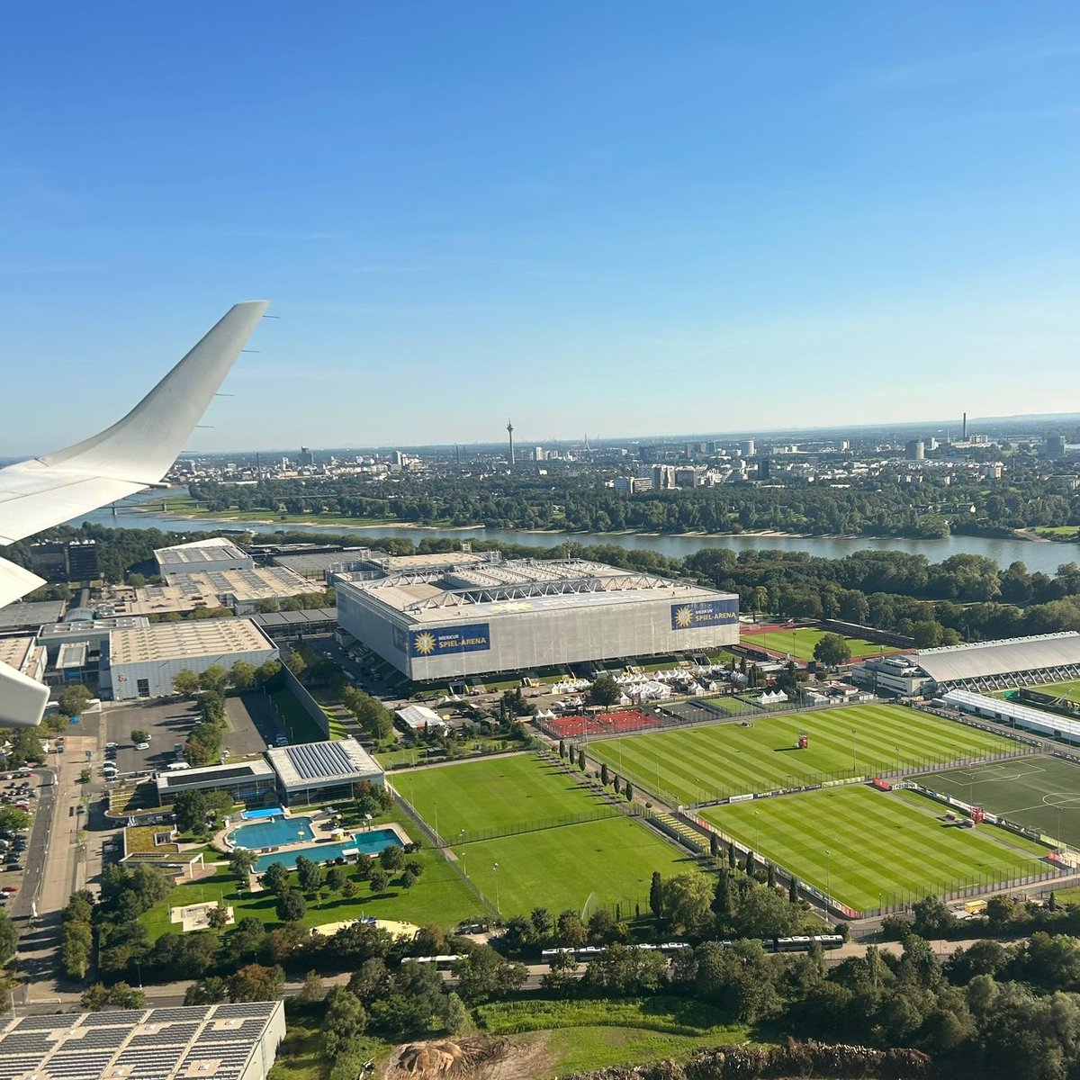 WeAreInvictus's tweet photo. The home for the #InvictusGames Düsseldorf 2023 is looking just as good on the ground as it does in the air. 

If you're flying into Düsseldorf be sure to look out your window for an amazing view. #WeAreInvictus 💛🖤 https://t.co/ohwKq0vSYQ