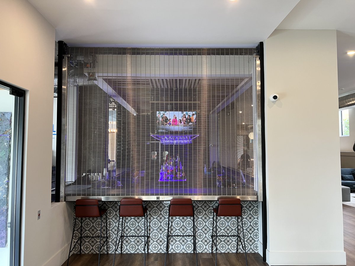We have just completed the installation of 2 custom SteelWeave stainless steel rolling security grilles manufactured by CornellCookson Architectural. These are to secure a bar at The Table restaurant in Jersey City, NJ. We only need the contractor to install the sheetrock soffits