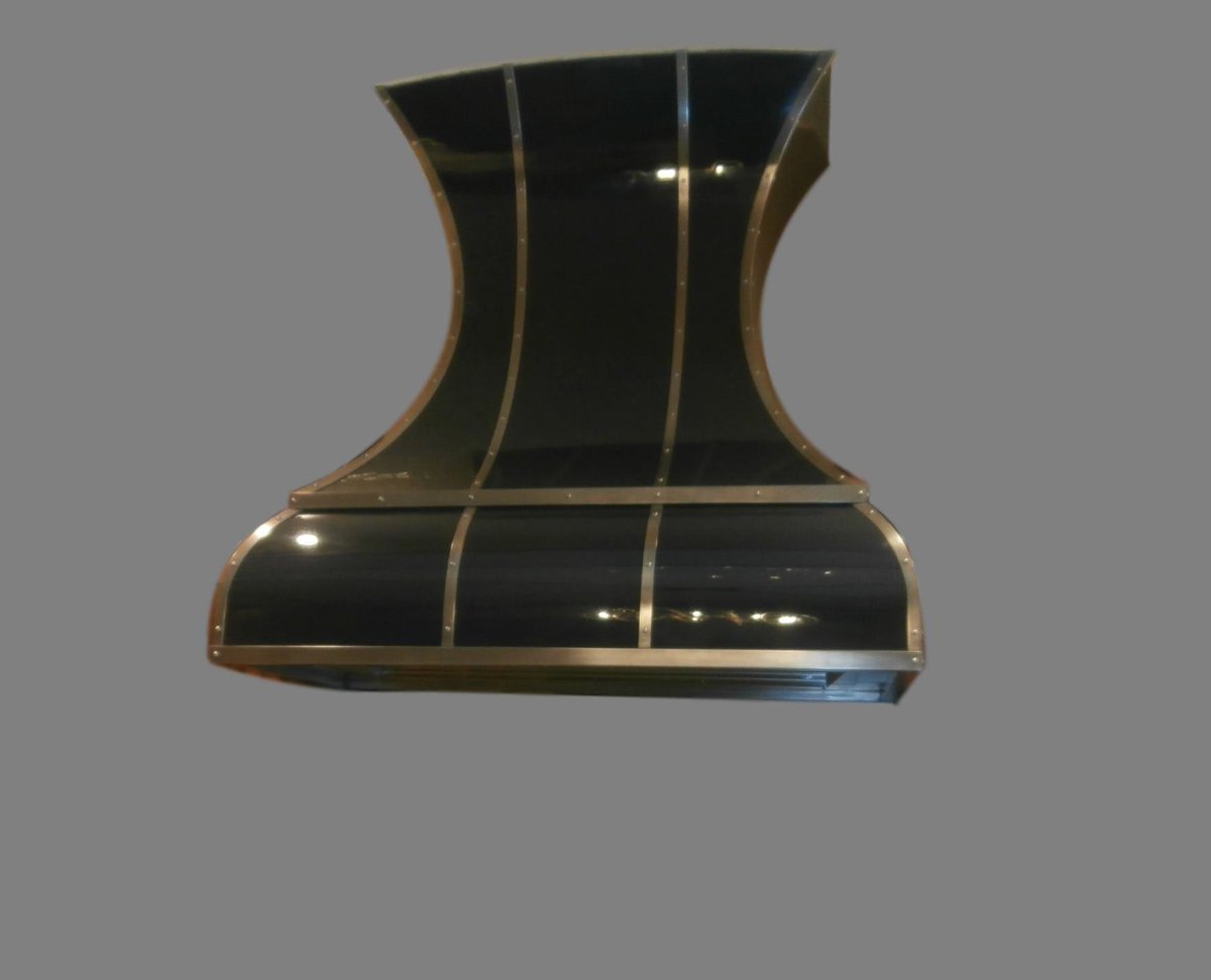 When the range hood has just got to be custom...
In this case, Art Noveau black lacquer with brass banding.