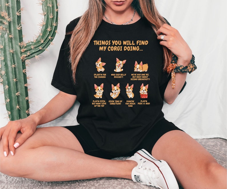 Dive into the Corgi World with our "Things You Will Find My Corgi Doing" Shirt! 
 Shop now: etsy.com/shop/splootvil…
#CorgiLove #SplootvilleStyle #HumorAndCharm #CorgiCharm #CorgiLovers #DogLoversFashion #QualityTees
