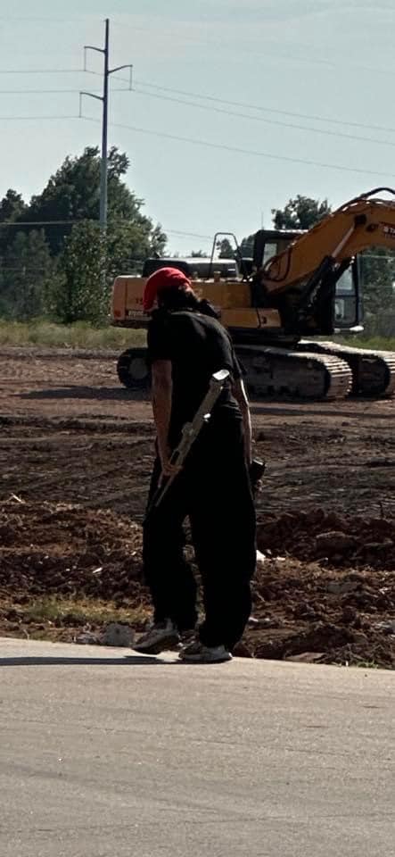 A MAN WAS POINTING WHAT APPEARED TO BE A RIFLE AT PASSING CARS near a shopping center in Shawnee Tuesday, according to 911 callers. Police arrested the suspect. Tonight at 6 on <a href="/NEWS9/">News 9</a> , details on what police say the man was holding, and what the suspect told investigators.