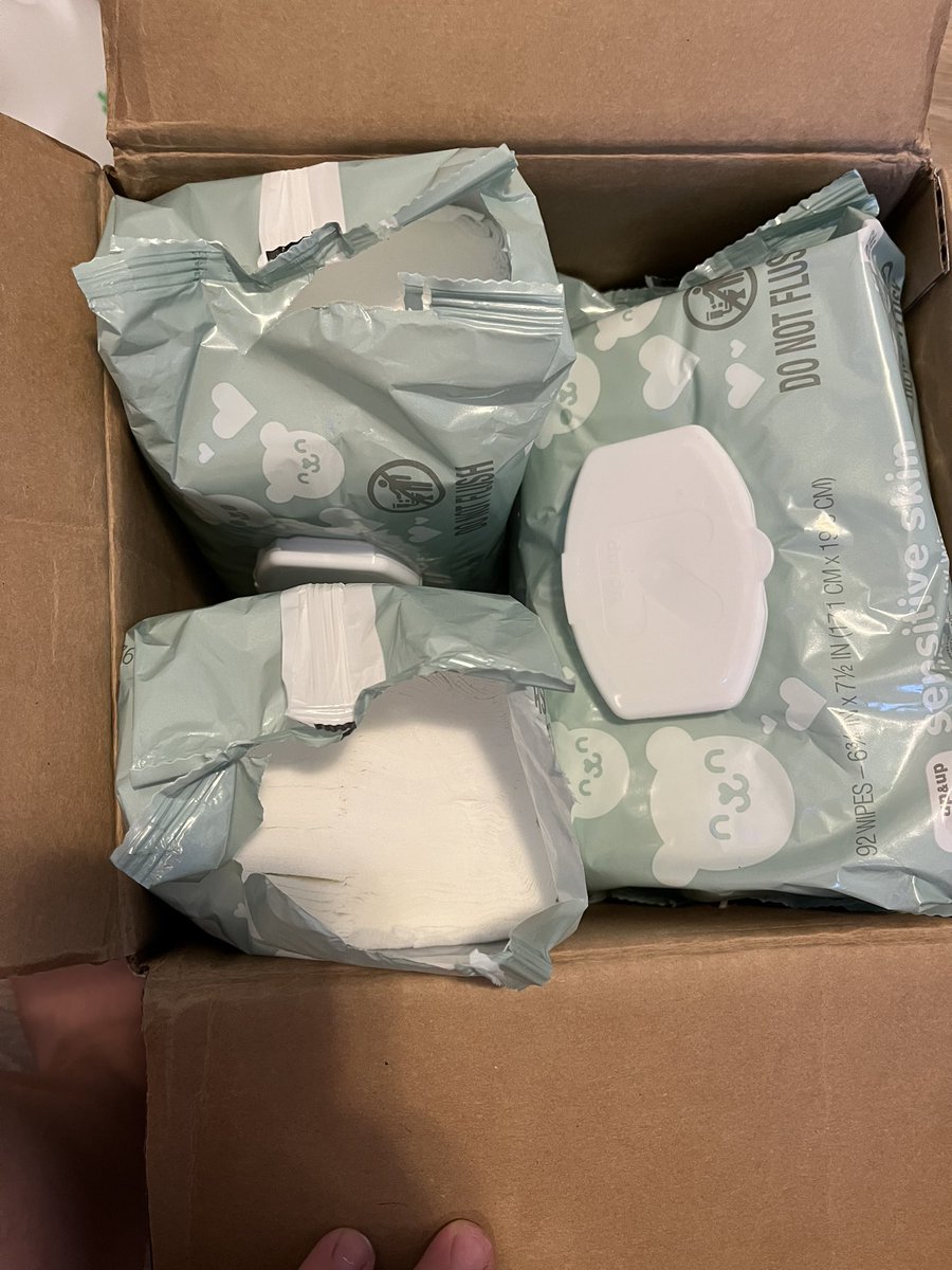 Melimoo93's tweet photo. @Target I ordered a box of baby wipes, and received my order today 4 of the packs were opened upon arrival. What do I do about this? https://t.co/SPKGmMucO7