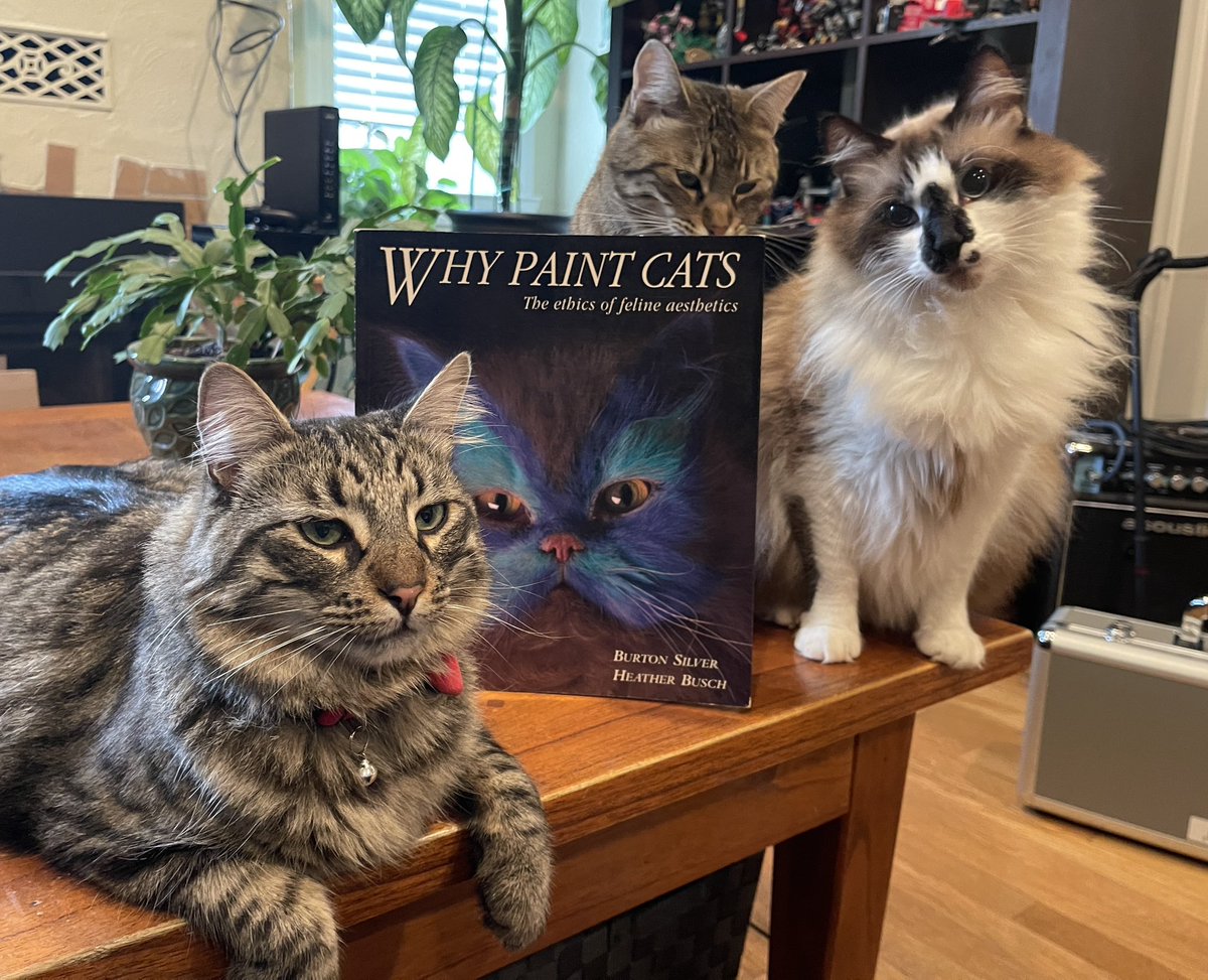 #PhotoChallenge2023September
Day 6: currently reading 
I can tell you what book we are not reading. We found this book in moms collection! She better not be getting any ideas! 🙀🎨🖌️🐈😹
#CatsOfTwitter #CatsOfX #XCats   #NationalReadABookDay