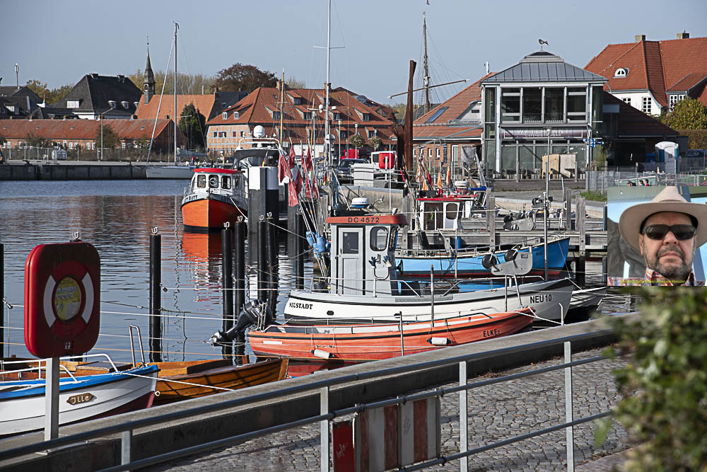 Enjoying the serene view of the harbor with colorful boats and buildings. #harborlife #photography #travel #Germany near #balticsea 
I wish everybody a nice Thursday -  #Follow for great content #creativity 
@K_Kameno
@wjacolyn @William67335893 @Rajeshaaaj @LibresCaminos