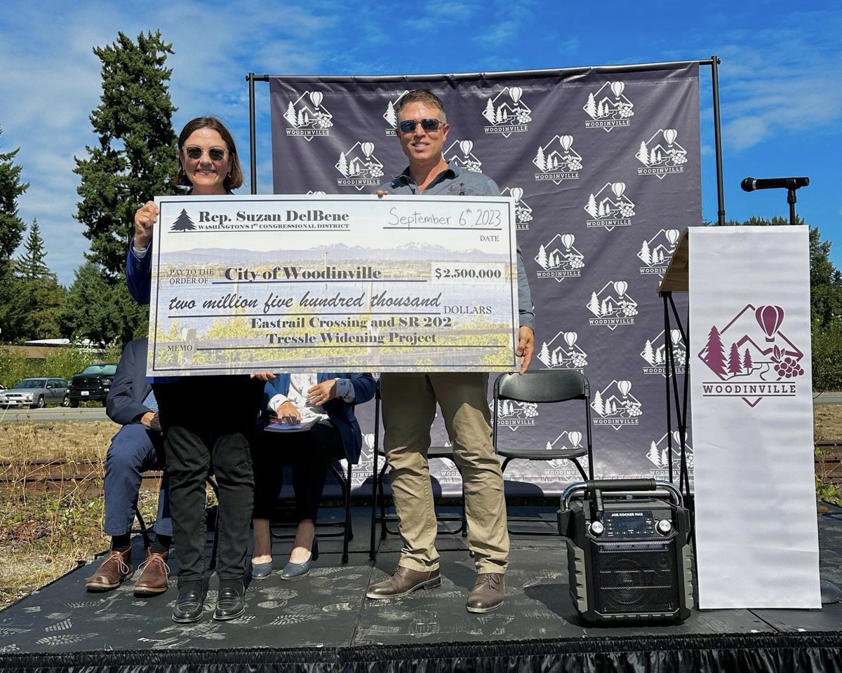 RepDelBene's tweet photo. Joined local leaders &amp; community members today to deliver a $2.5M check for Woodinville’s Eastrail crossing &amp; SR 202 widening project.
 
These resources will help further build out the Eastrail network, make our communities safer, &amp; connect residents with more transit options. https://t.co/KZ9NG84ilR