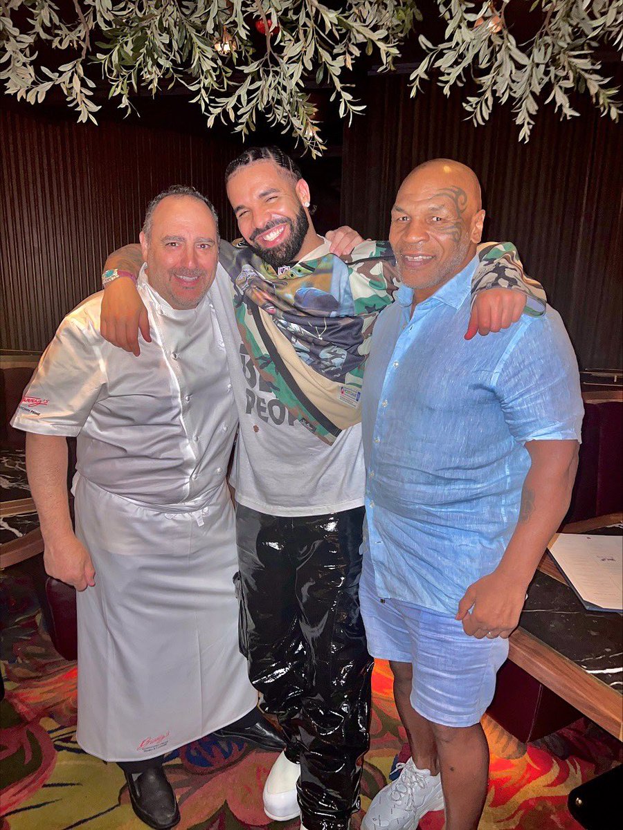 When legends collide at #BarrysDowntownPrime… 🤩 Grammy award-winner, @Drake, and boxing phenomenon/actor and comedian, @MikeTyson, happened to be dining at the exact same time! They came together to snap an absolutely ICONIC photo with our co-owner @ChefBarryDakake! 📸