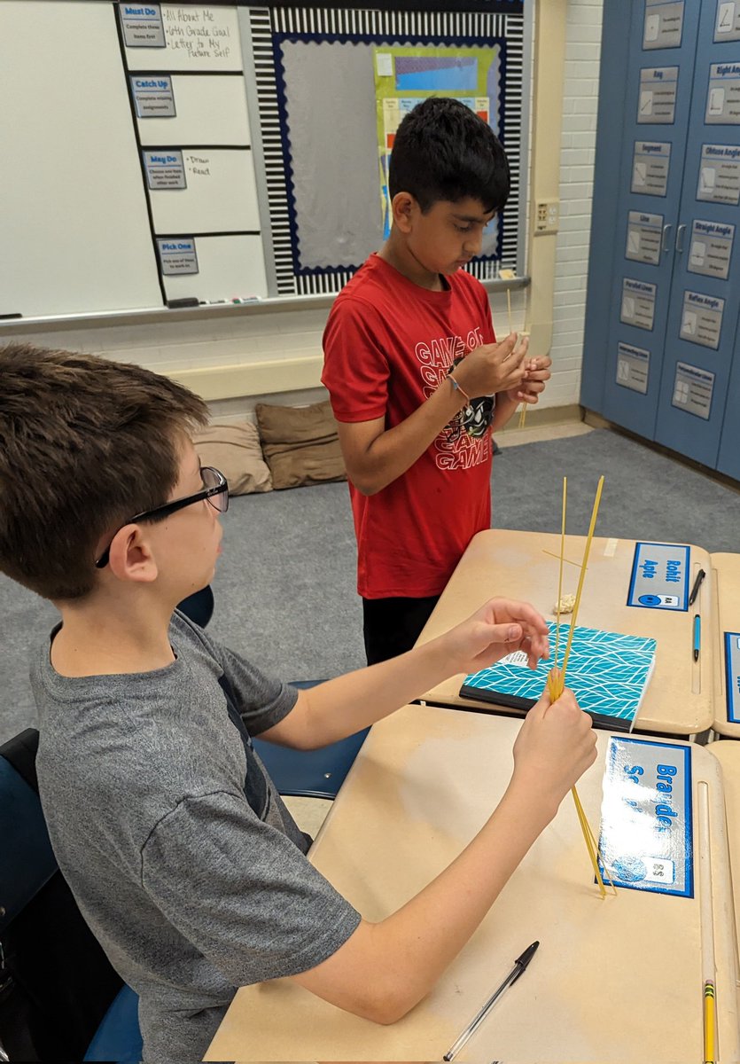 CB_MrHeinlein's tweet photo. Collaborating and using teamwork to build the marshmallow tower. Great conversations come from this challenge! https://t.co/UmfLs2B6TY