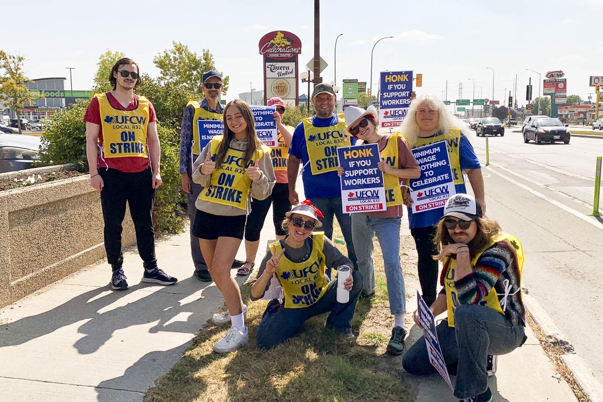 The sun is shining on this energetic young crowd as the Celebrations Strike has begun!!  The picket line is up and running at 1824 Pembina Hwy in front of Celebrations on the sidewalk.

The picket line will be running from Wed-Sun!  Come on down and show your support!