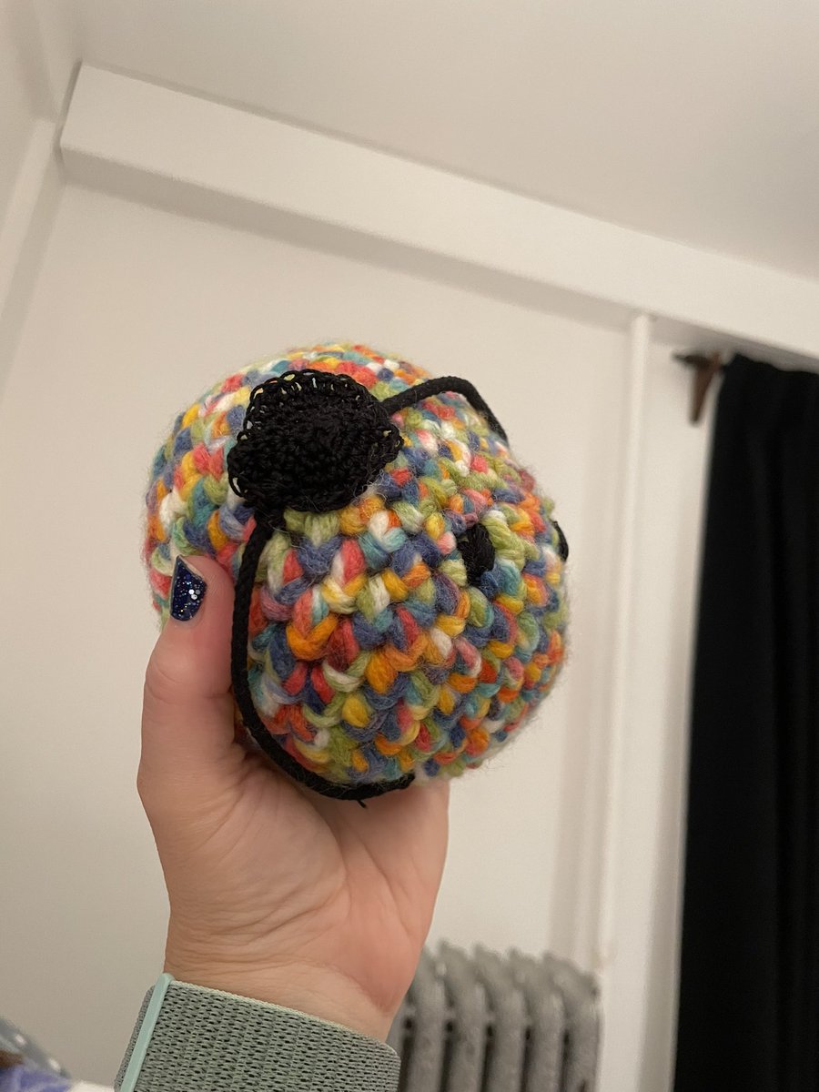 MelissaANathan's tweet photo. My first SMeep! I used yarn that I already had but it’s pretty thick, so my SMeep is pretty big. I used tie line, embroidery floss, & crochet thread for the eyes & headset. I’ll definitely do it differently next time, but it’s cute.
Thanks to @cue2_go for the idea/pattern! https://t.co/EBTkUrR9w2