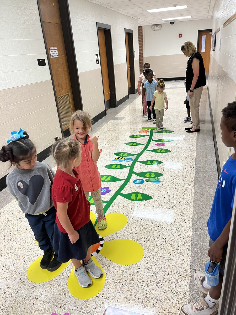 JessicaHeckard's tweet photo. Our students enjoying our newly installed sensory path! It has been a huge hit with students! 💛🖤 #watchuswork @DariaP1980 @brynn_kardash https://t.co/5UAzfnGIhW