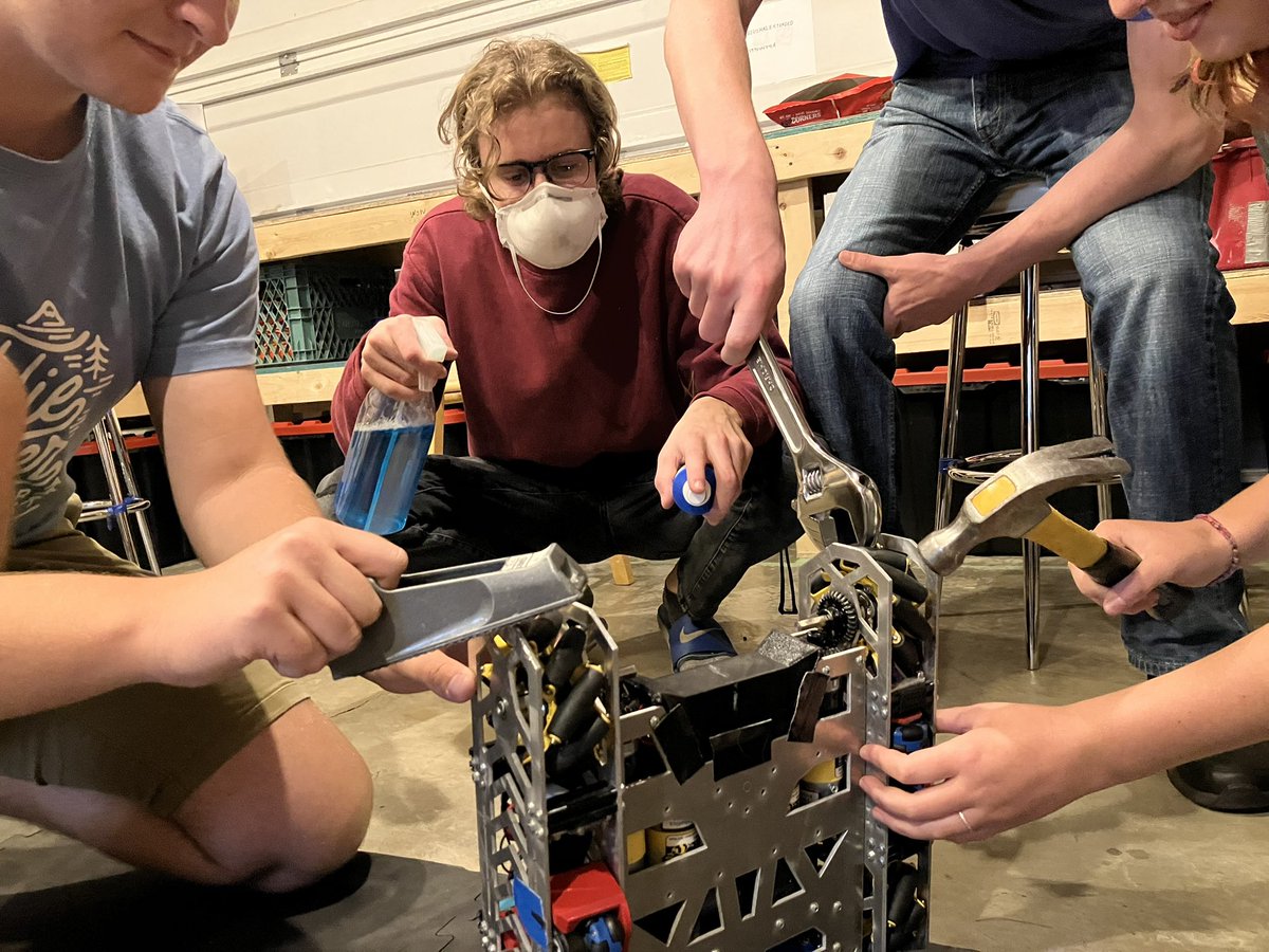 Working on the robot.. all hands on deck! 🤖
