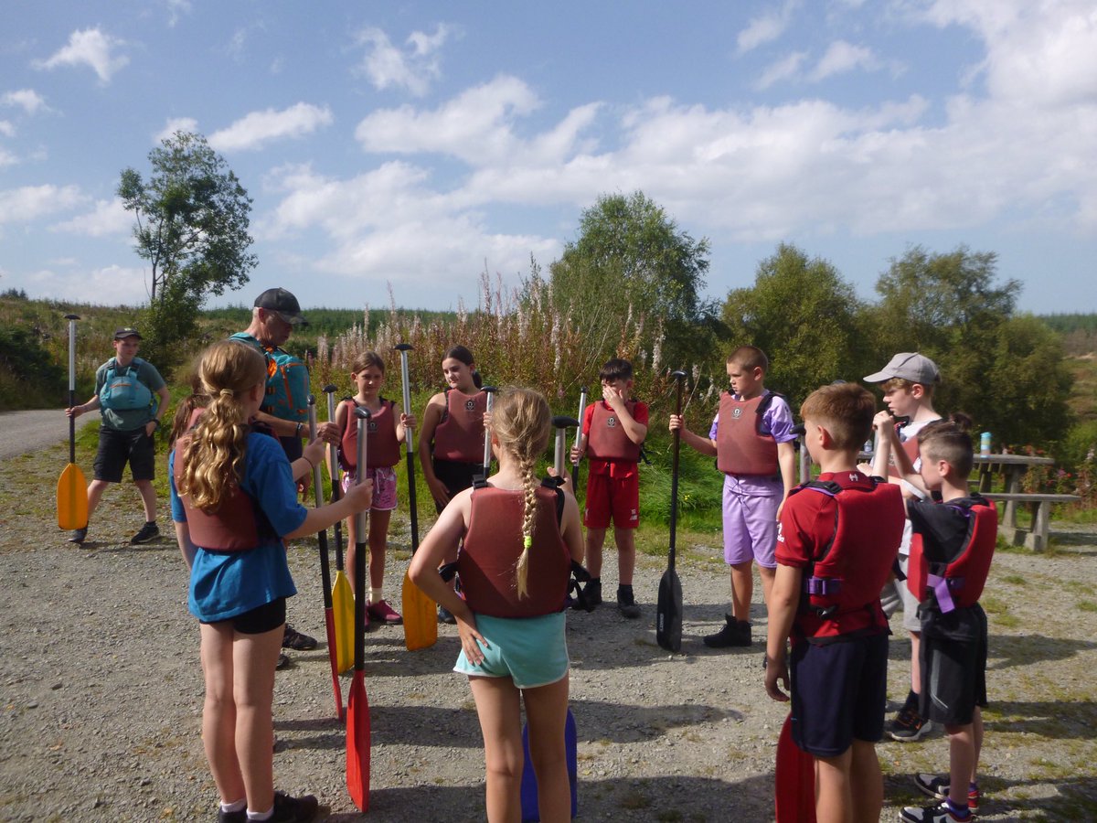 DosbarthE's tweet photo. Mrs Hooson’s group went canoeing 🛶 on Lyn Brenig in the sunshine and had a rather wet but extremely fun time 🥳 @SychdynSchool https://t.co/W8EiTkd31H