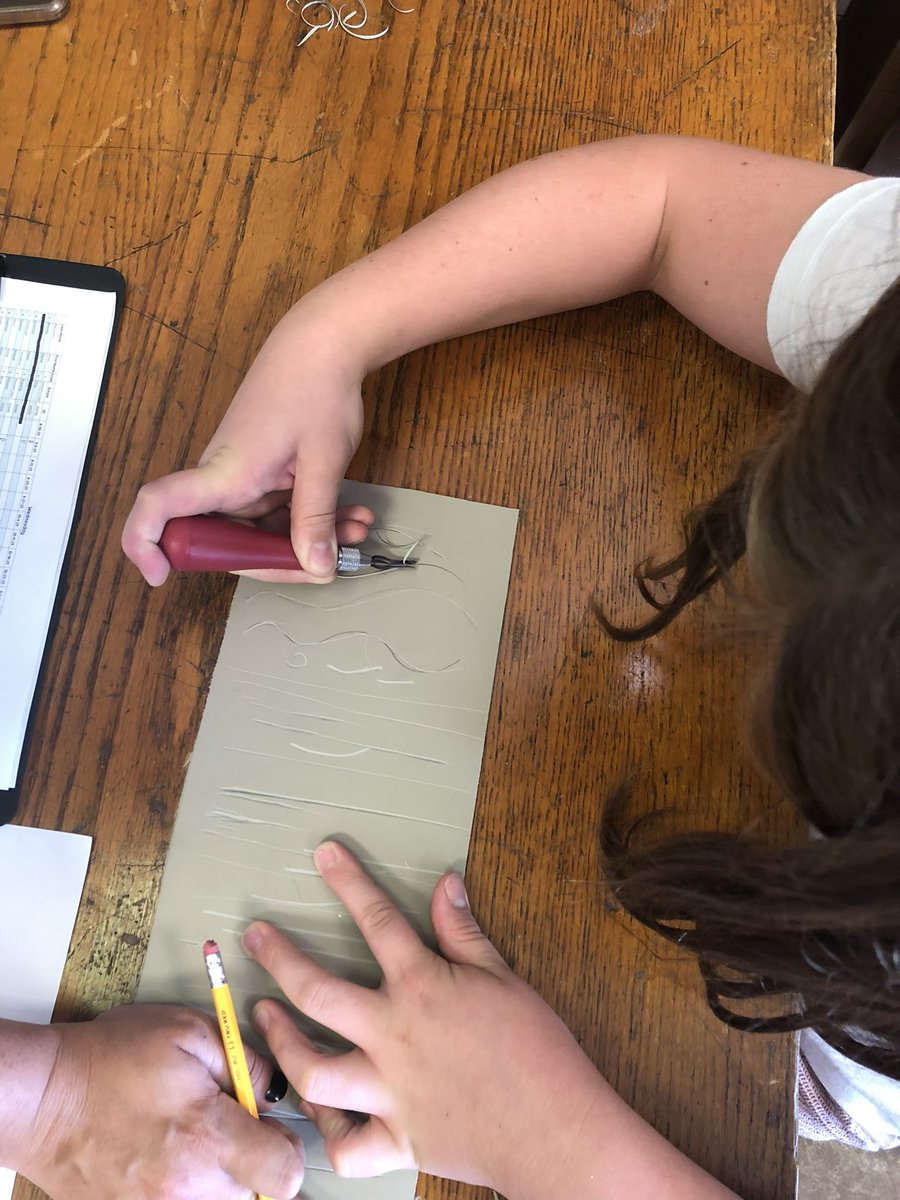 Mrs Carlson and Mrs Gardner’s Authentic Artist class learning and practicing their skills to use a Lino cutting tool <a href="/PhelpsCenter/">Phelps Center</a>