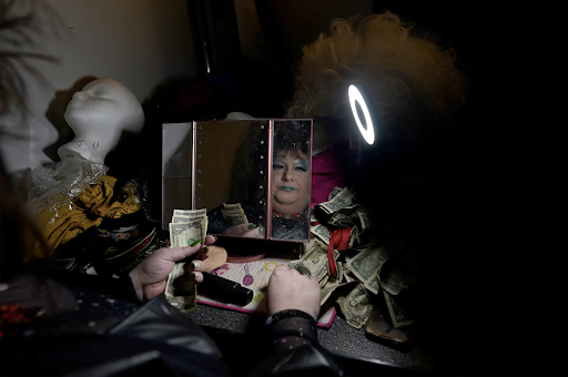 sundaylongread's tweet photo. Demonstrating the not-so-hidden complexity of small-town life, AP photographer @CKaster spent more than a year documenting the popularity of drag performers in Pennsylvania’s conservative coal country. #SundayStill https://t.co/SfQ2ViTA8C