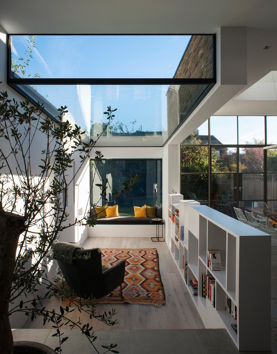 Fantastic view of the #library area with the #glassroof and the #orielwindow overlooking the beautiful interior garden in our #MCA_Abstractbarnes architectural extension project in #London #UK
 #Barnes #extension #architecture #architettura  #newlondonarchitecture #interiors